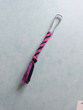 Pink, purple, and black zip clip
