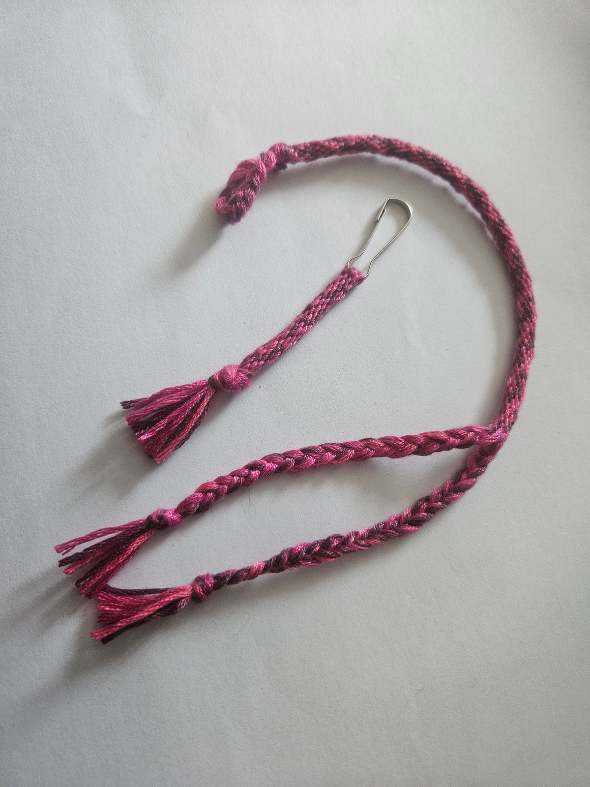 Pink and purple wristband and zip clip